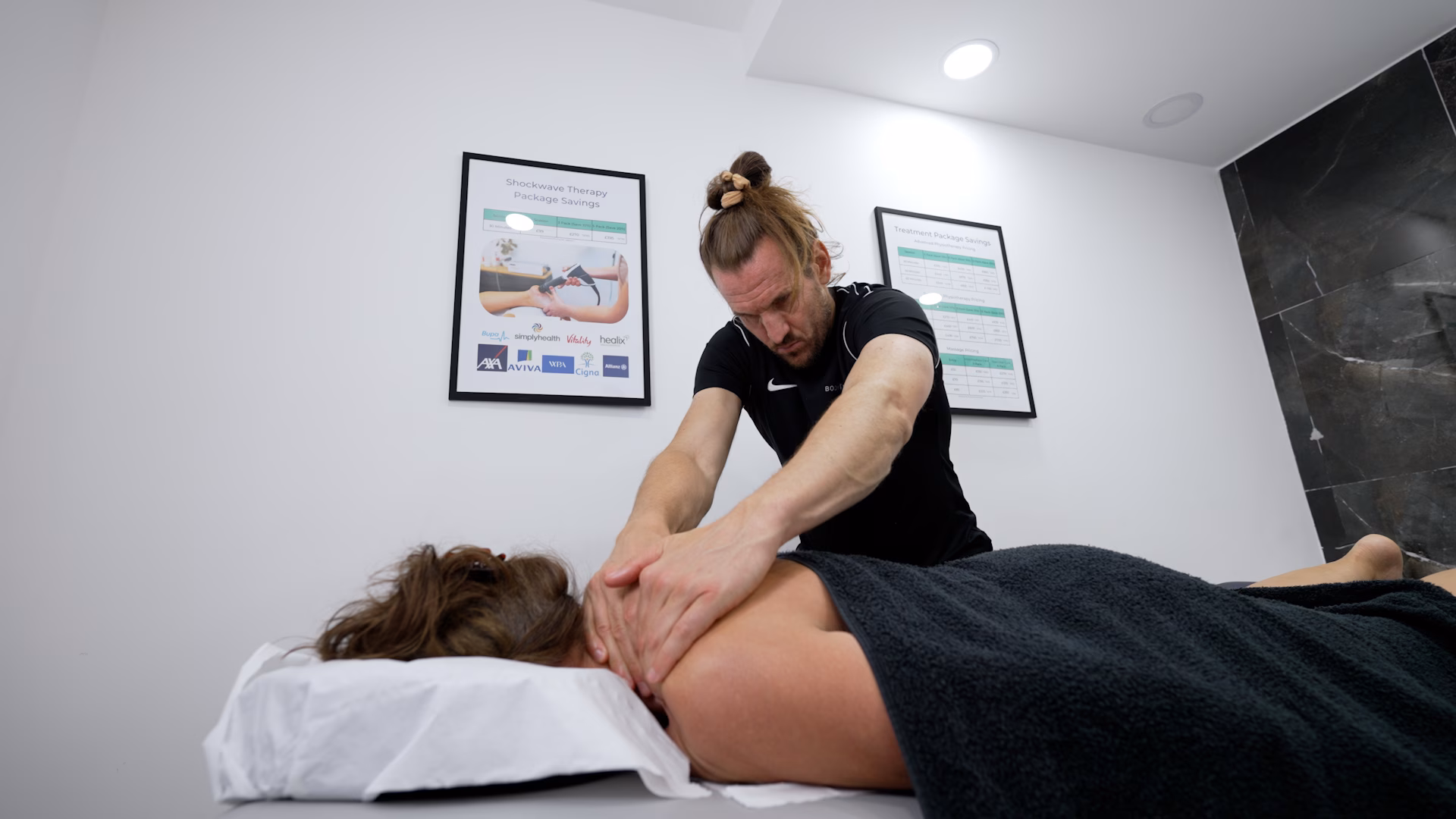A Bodylogics therapist providing a pregnancy massage